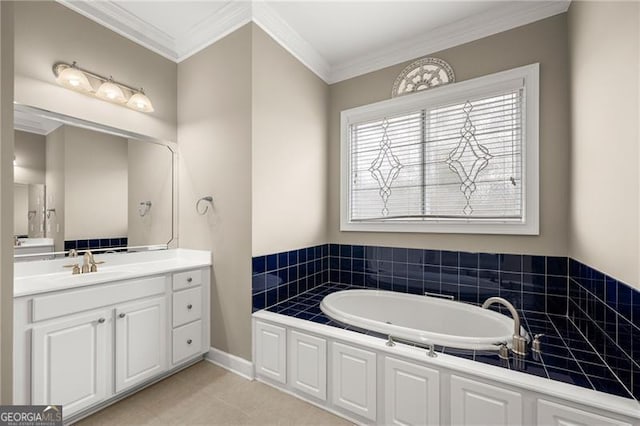 bathroom featuring a bath, ornamental molding, vanity, and tile patterned floors