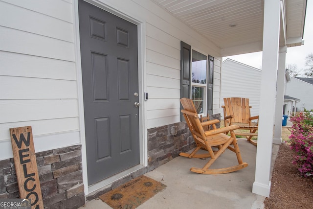 property entrance with a porch