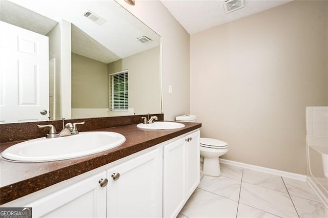 spare room featuring a tray ceiling, ornamental molding, dark wood-type flooring, and ceiling fan