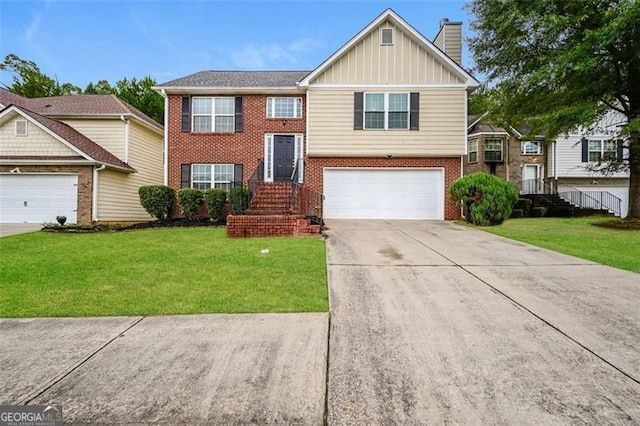 split foyer home featuring a garage and a front yard