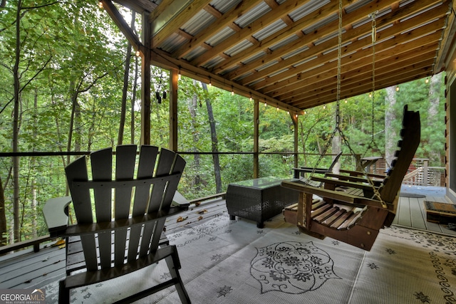 sunroom / solarium featuring plenty of natural light