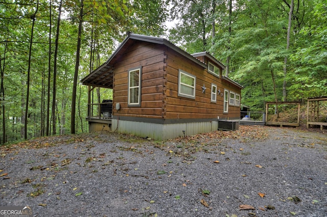 view of property exterior with cooling unit