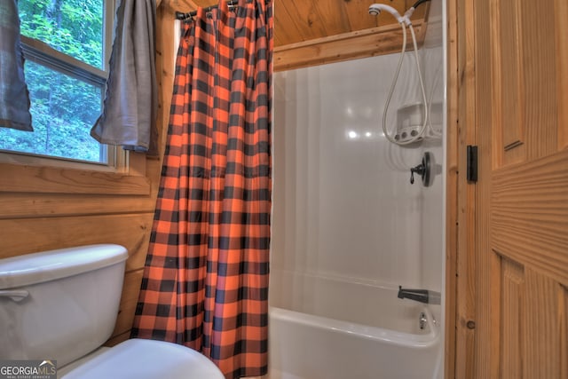 bathroom with wood ceiling, toilet, and shower / bath combination with curtain