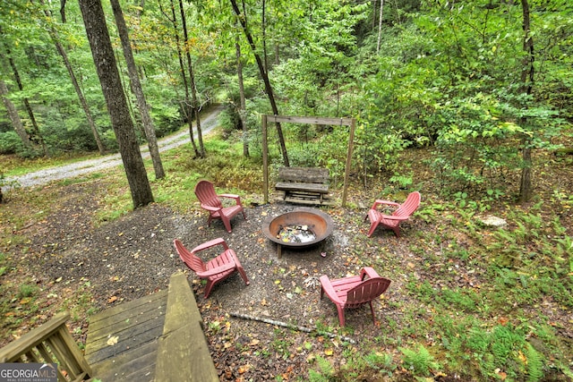 view of yard featuring a fire pit