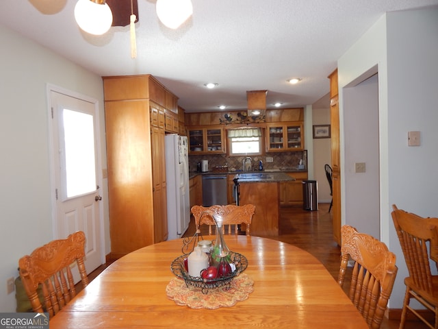 dining space featuring dark hardwood / wood-style floors