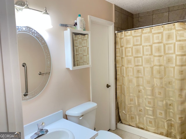 bathroom with tile patterned flooring, a textured ceiling, sink, a shower with curtain, and toilet