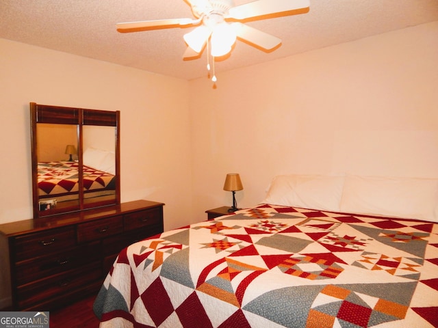 381 Hidden Lakeview Cir, Hiawassee, GA 30546 - bedroom with a ceiling fan and a textured ceiling