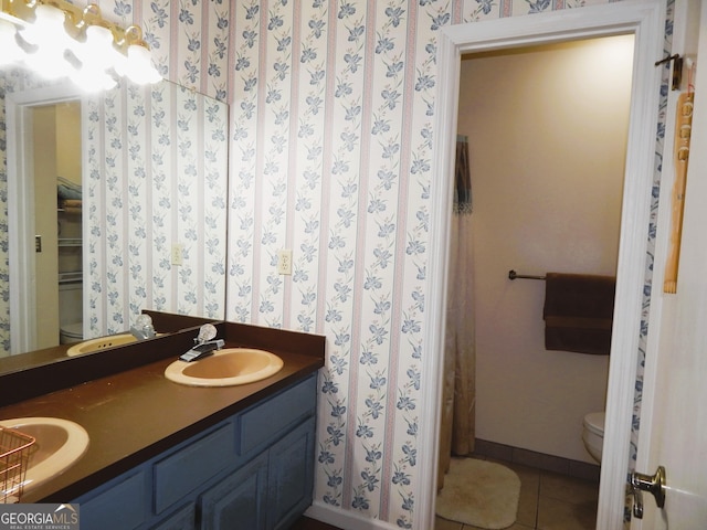 381 Hidden Lakeview Cir, Hiawassee, GA 30546 - bathroom featuring toilet, tile patterned floors, double vanity, and baseboards