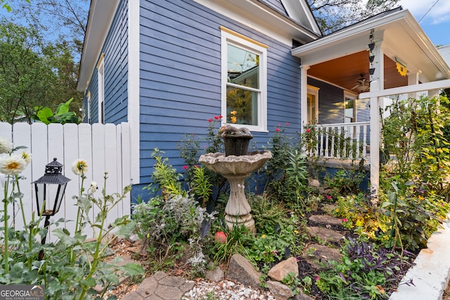 view of side of property featuring ceiling fan