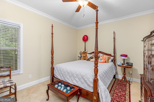 bedroom with crown molding, ceiling fan, light carpet, and multiple windows