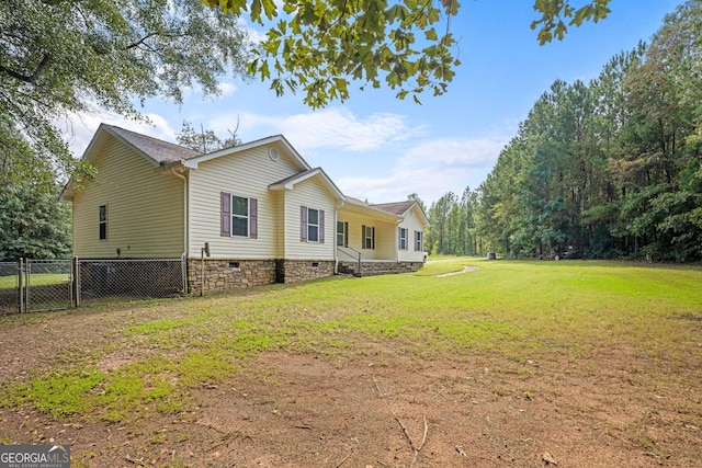 view of property exterior featuring a yard