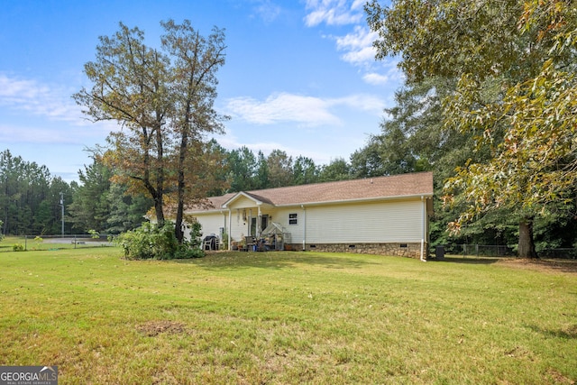 ranch-style house with a front yard