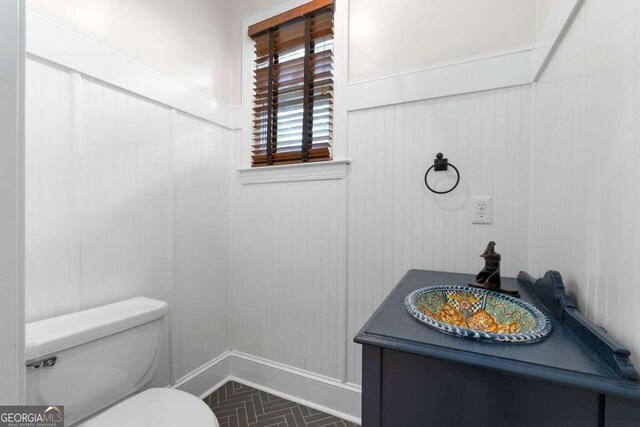 bathroom with vanity and toilet