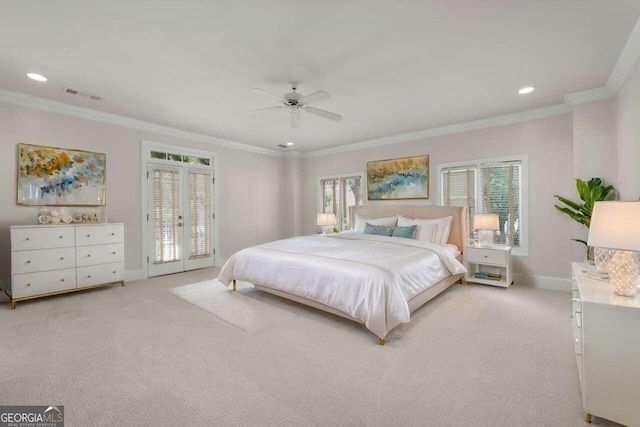 carpeted bedroom with multiple windows, ceiling fan, access to exterior, and crown molding