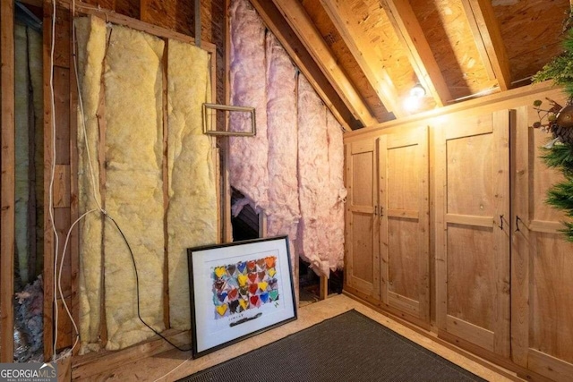 interior space featuring lofted ceiling