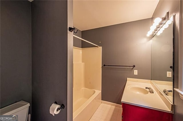 full bathroom featuring tile patterned floors, washtub / shower combination, vanity, and toilet