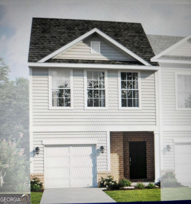 view of front of house with roof with shingles, concrete driveway, brick siding, and a garage
