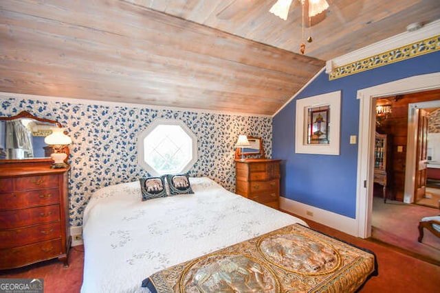 carpeted bedroom with vaulted ceiling, ceiling fan, and wooden ceiling