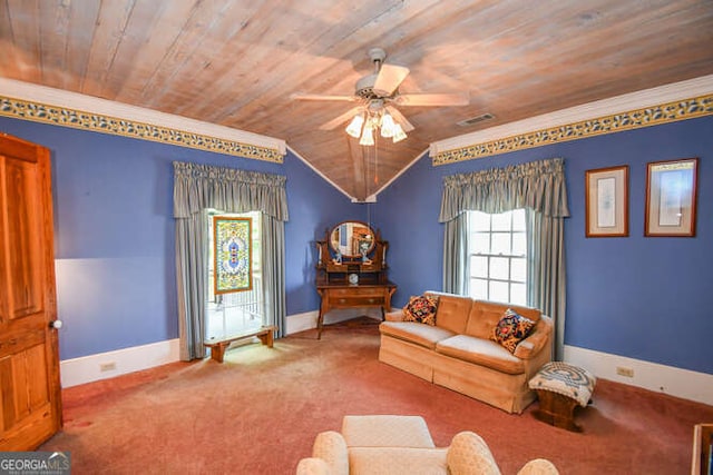 living room featuring ceiling fan, lofted ceiling, ornamental molding, wooden ceiling, and carpet floors