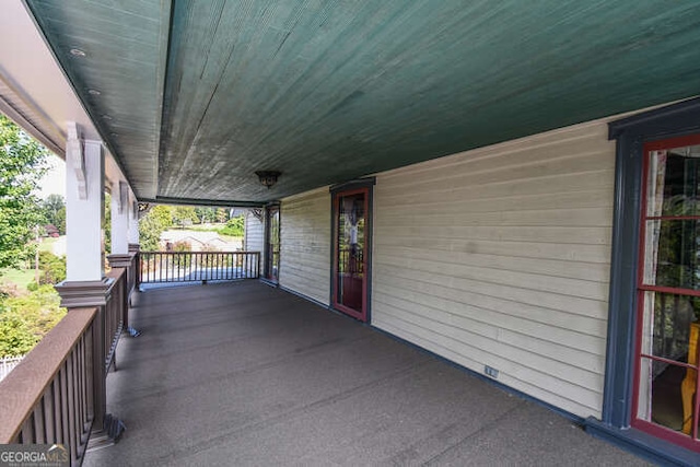 view of patio featuring a porch