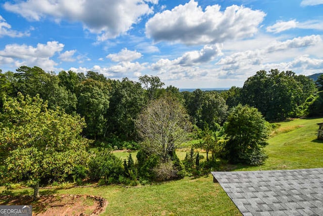 exterior space featuring a lawn