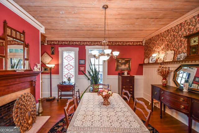 dining area featuring wooden ceiling, ornamental molding, and a wealth of natural light