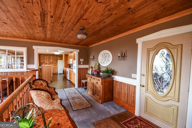 entryway featuring wooden walls, crown molding, dark hardwood / wood-style flooring, and wooden ceiling