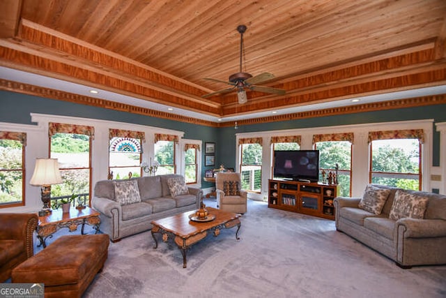 carpeted living room with wooden ceiling, ceiling fan, and a wealth of natural light