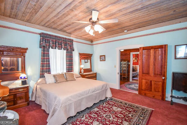 carpeted bedroom with ornamental molding, ceiling fan, and wooden ceiling