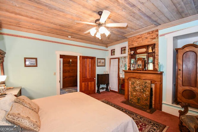 carpeted bedroom featuring wood ceiling and ceiling fan