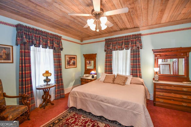 carpeted bedroom featuring wooden ceiling, crown molding, and ceiling fan