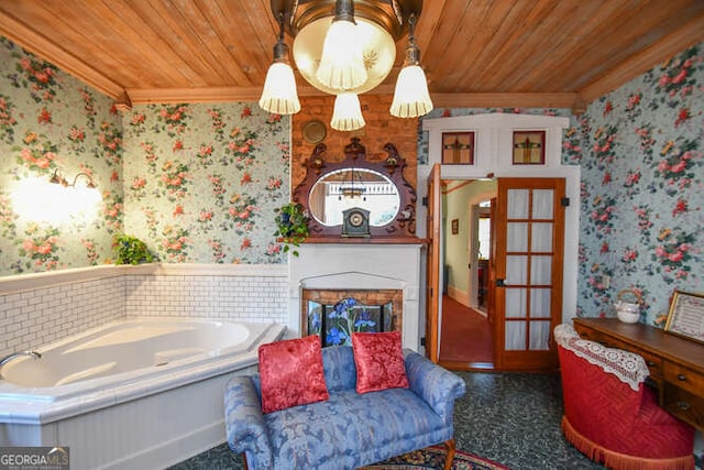 bathroom featuring french doors, a bathing tub, ornamental molding, and wooden ceiling