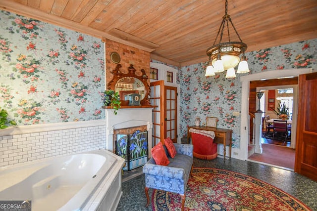 bathroom featuring a tub, an inviting chandelier, a fireplace, and wooden ceiling