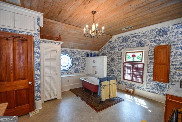 bedroom with lofted ceiling, a chandelier, and wood ceiling