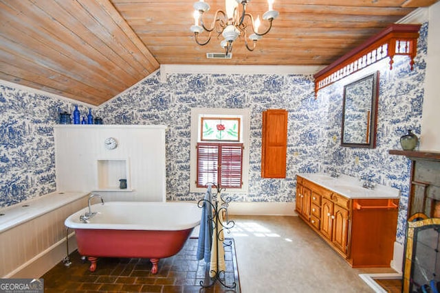 bathroom featuring vanity, a bath, a chandelier, wooden ceiling, and vaulted ceiling