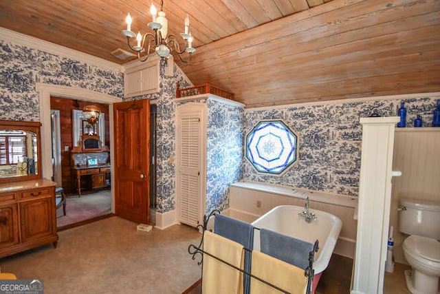 bathroom with a notable chandelier, wood ceiling, a bathtub, and toilet