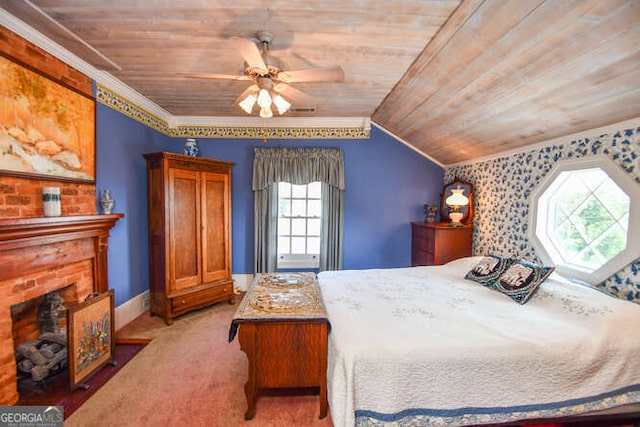 carpeted bedroom featuring lofted ceiling, ceiling fan, wooden ceiling, and a fireplace