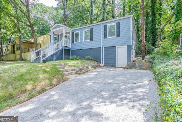 2836 Harlan Dr, Atlanta, GA 30344 - view of front of property featuring a front lawn, stairs, and a porch
