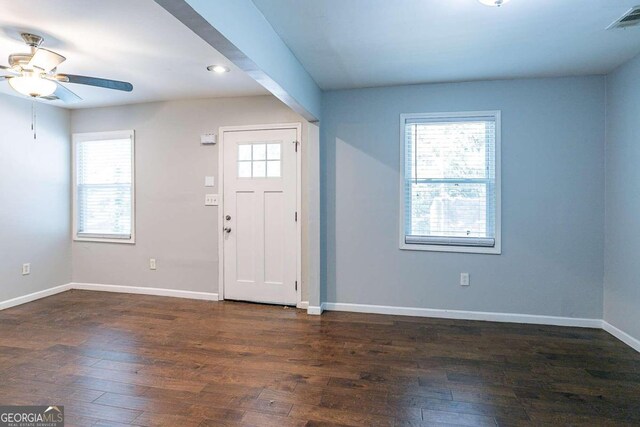 2836 Harlan Dr, Atlanta, GA 30344 - entrance foyer with dark wood-type flooring, a healthy amount of sunlight, and visible vents