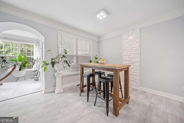 dining room with ornamental molding