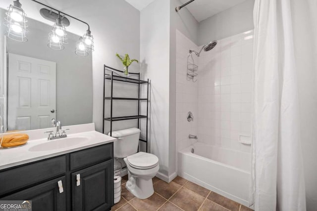 full bathroom featuring tile patterned flooring, shower / bathtub combination with curtain, toilet, and vanity