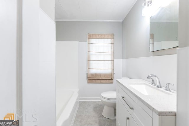 bathroom featuring vanity, crown molding, toilet, and tile patterned flooring