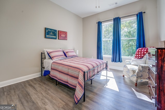 bedroom featuring dark hardwood / wood-style floors