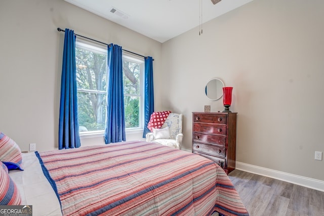 bedroom featuring hardwood / wood-style flooring