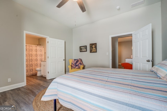 bedroom with connected bathroom, dark hardwood / wood-style flooring, and ceiling fan