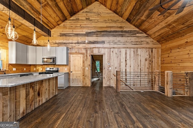 kitchen featuring appliances with stainless steel finishes, light stone counters, white cabinets, wooden ceiling, and decorative light fixtures