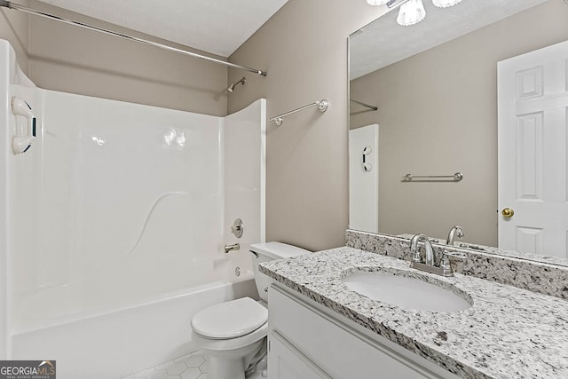 full bathroom with bathtub / shower combination, tile patterned floors, vanity, and toilet