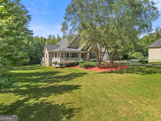 exterior space featuring a porch and a garage