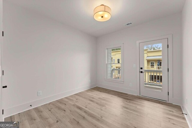 entryway with light hardwood / wood-style flooring