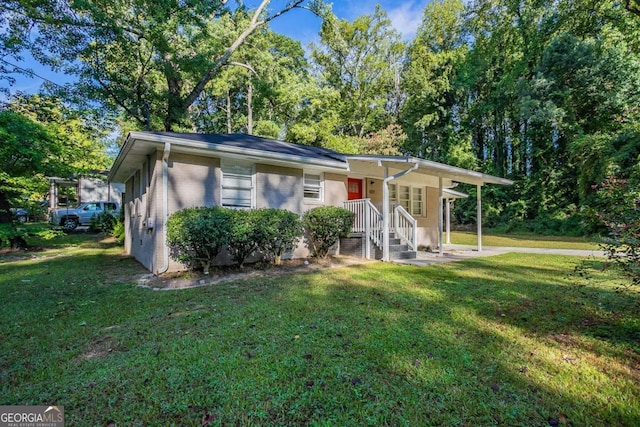 view of front of home with a front yard